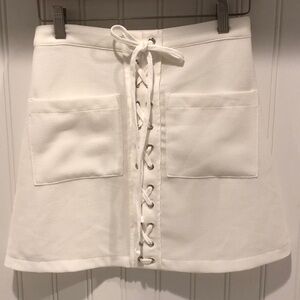 Gab & Kate white skirt - mod & trendy lace up miniskirt, size small (26)